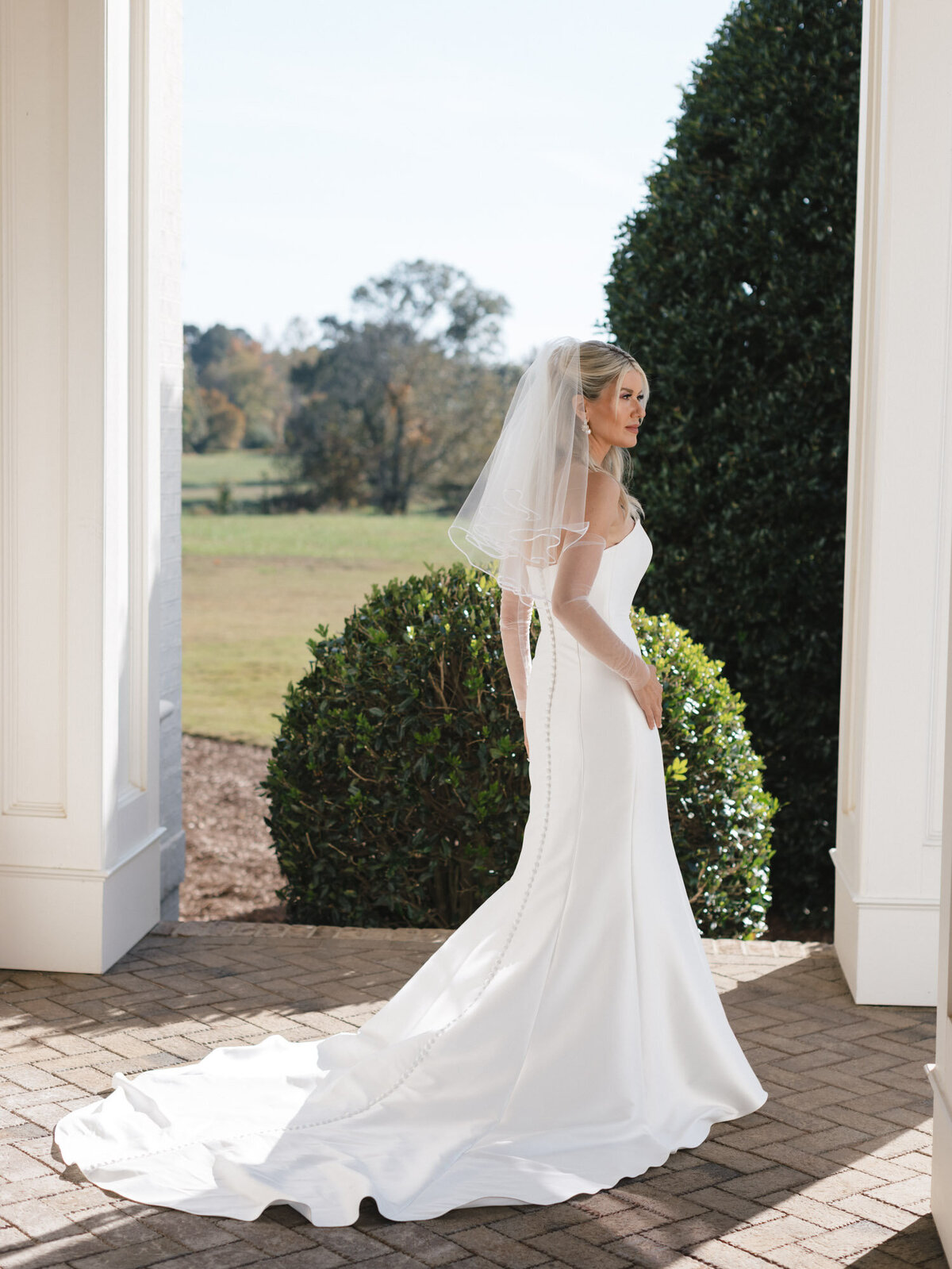 The back of a beautiful modern classic wedding dress at Donovan Manor