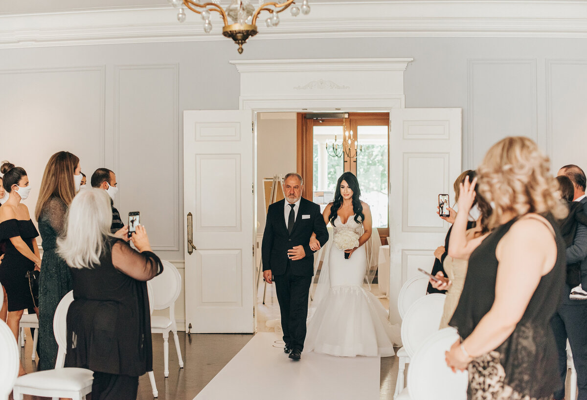 Bride walking up the aisle with her father