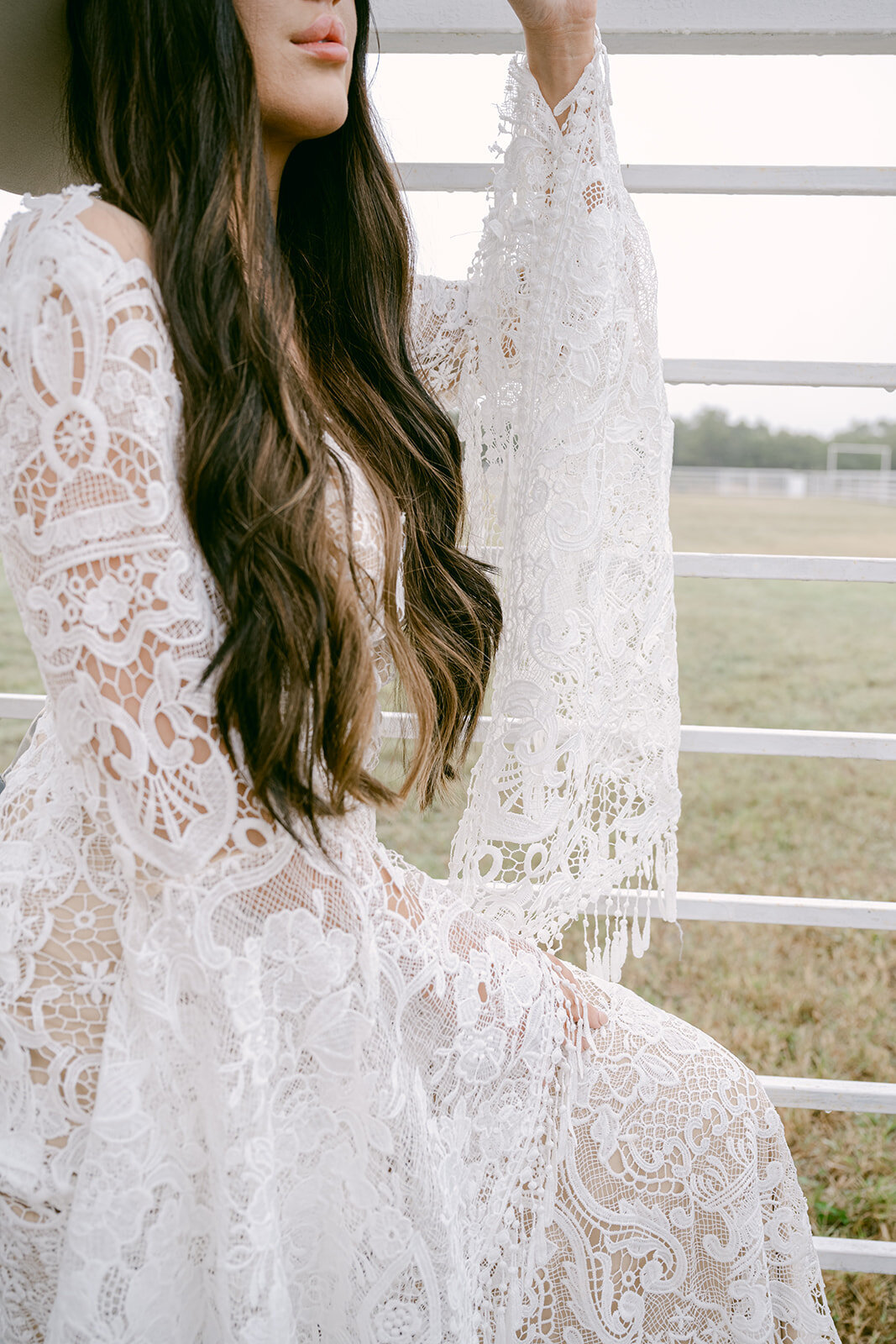 Editorial bridal portrait at The Videre Estate wedding venue featuring boho lace gown and bridal hat.