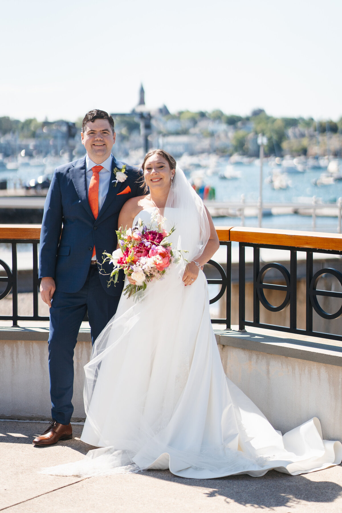 Celebrate your summer wedding at Eastern Yacht Club captured by Danielle Little Photography. Discover breathtaking waterfront views and timeless moments expertly captured, ensuring your special day is preserved with elegance and grace.