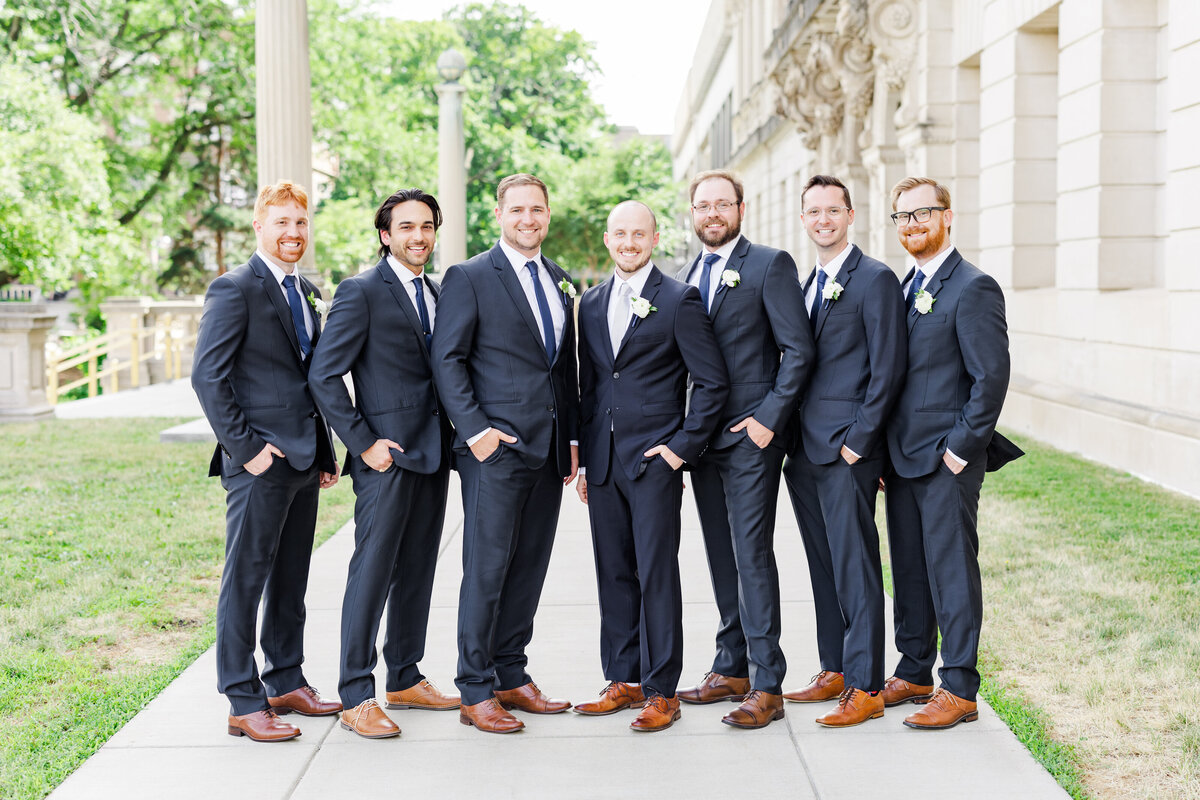 28_groomsmen_lined_up_madison_historical_society_building