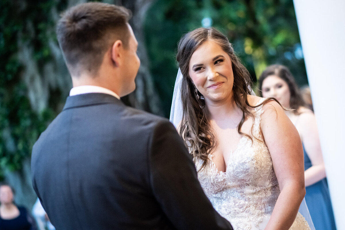 Bride smiling at groom at Southern Oaks wedding