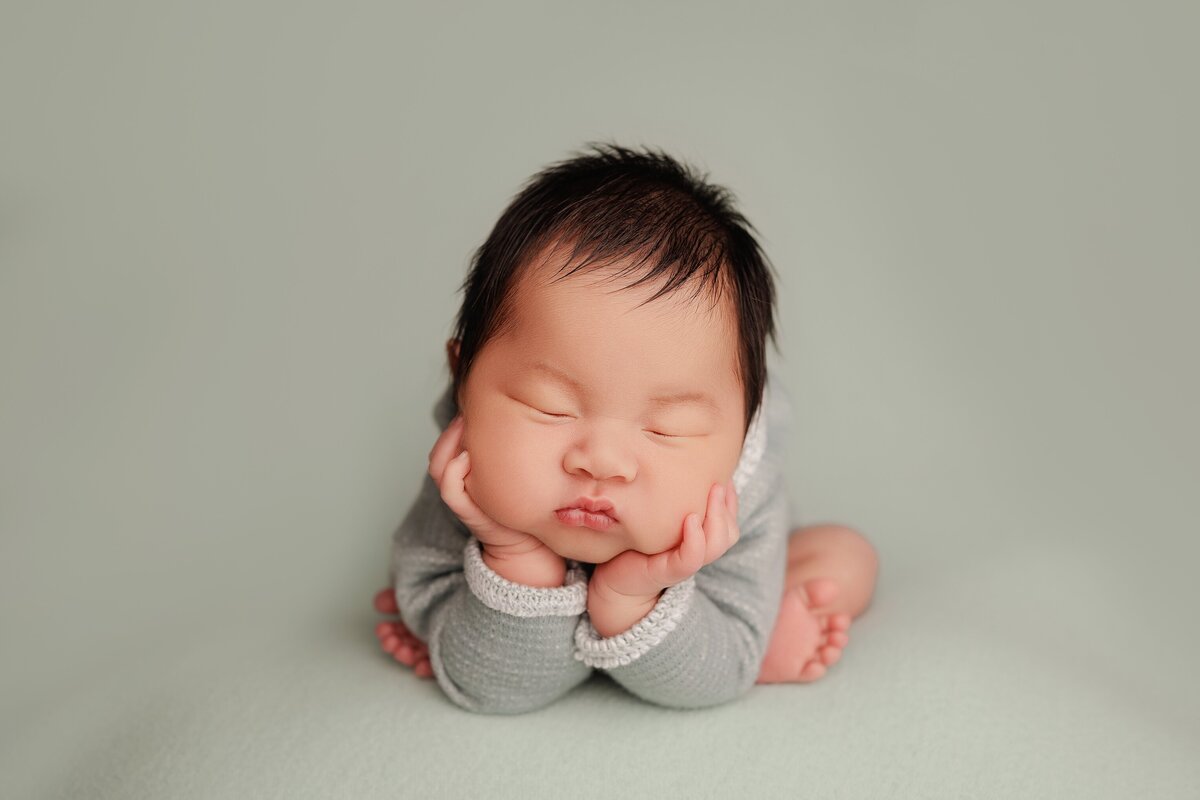 Beautiful newborn portraits in Elk Grove and Sacramento, capturing your baby's precious moments with simple elegance. Book your session today