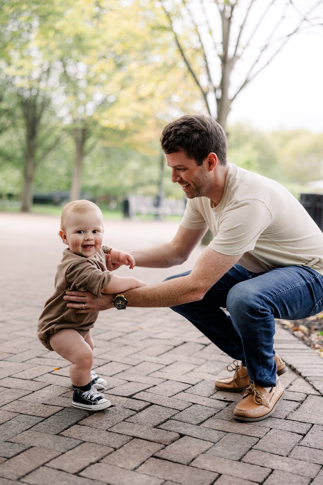 Couple in a park in the Finger Lakes for a family session