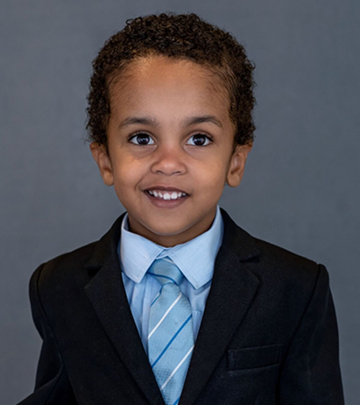 Authentic school portrait, child’s personality captured by Amy Williams in Metro Vancouver