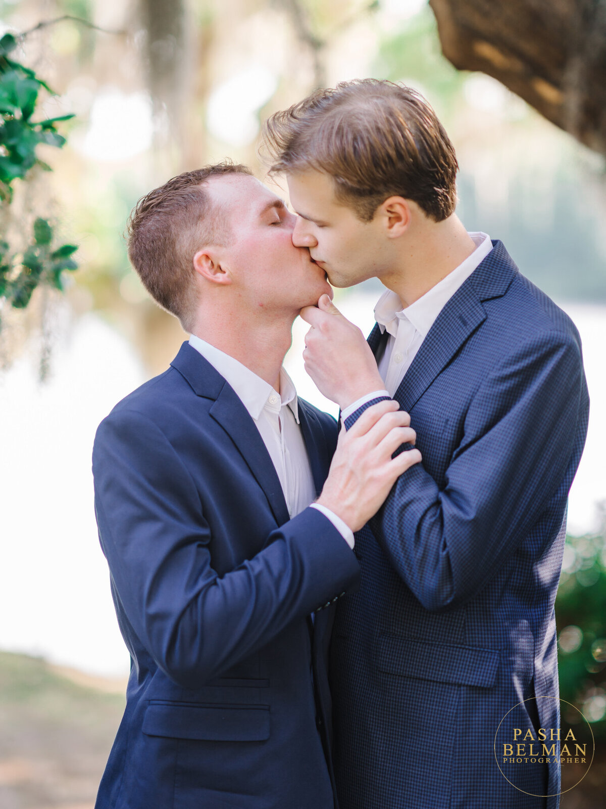 Gay couple of grooms pose for photographs whiel tying shoe laces Stock Photo  | Adobe Stock