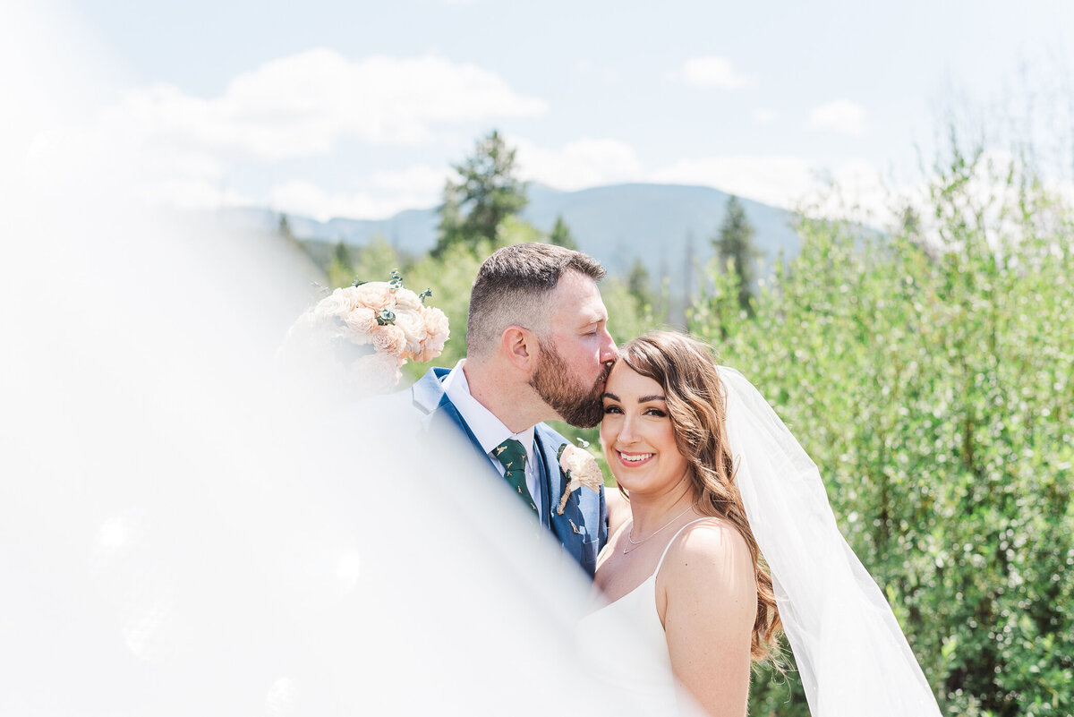 veil shot of a couple together
