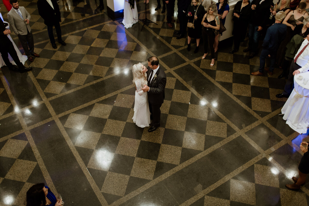 Fort Worth Wedding Photographer Megan Christine Studio captures an elegant ballroom first dance. 