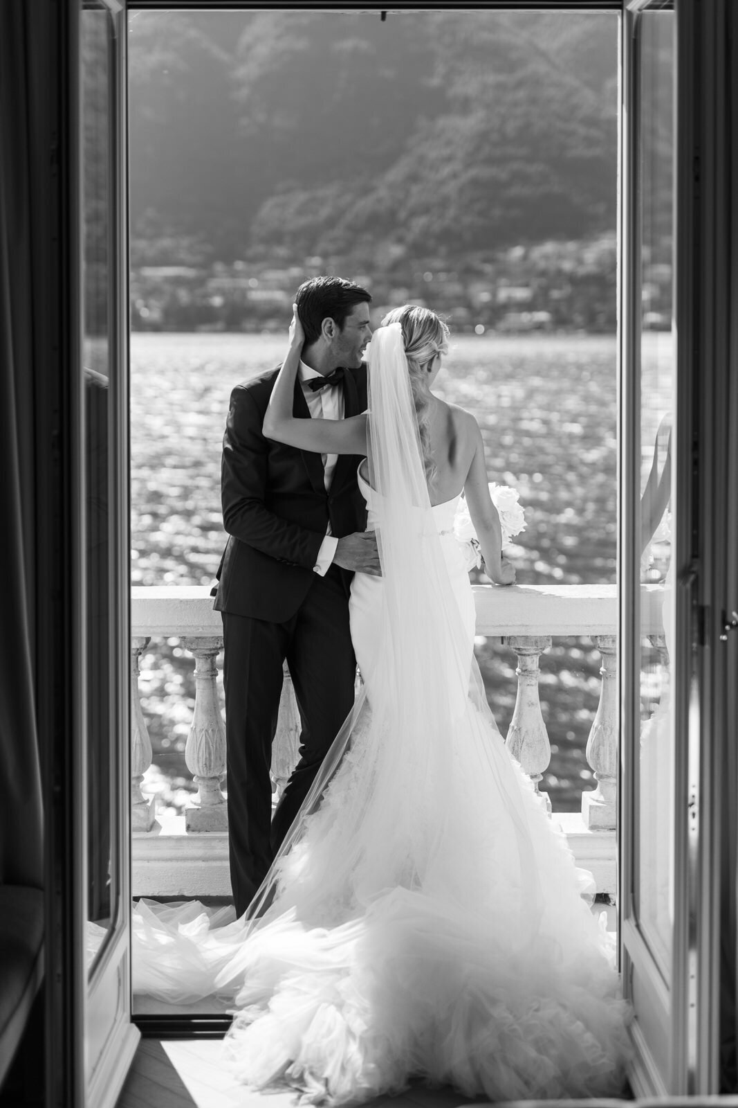 black and white wedding. portrait overlooking lake como