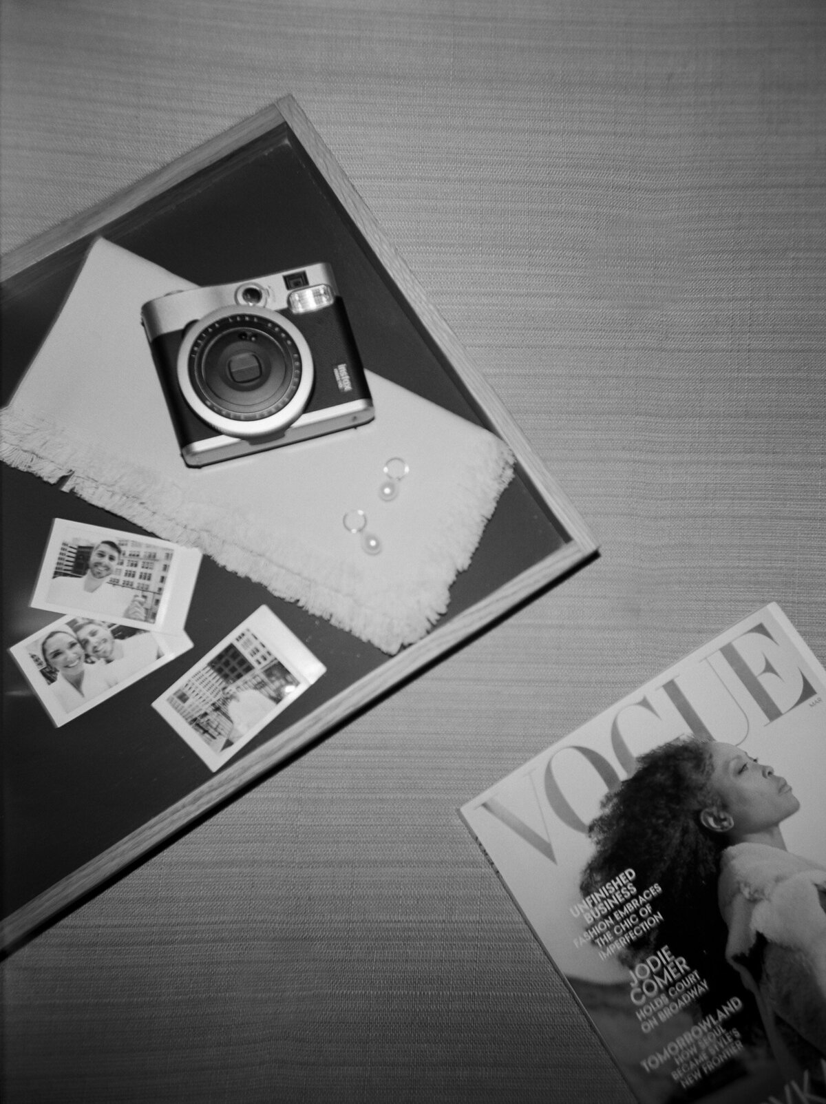 natural flatlay details, vogue magazine, camera, pearl earrings