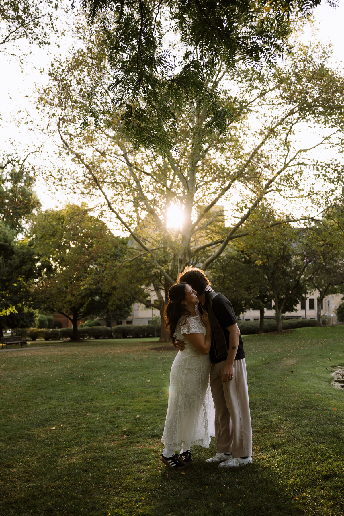couple hugging in a park