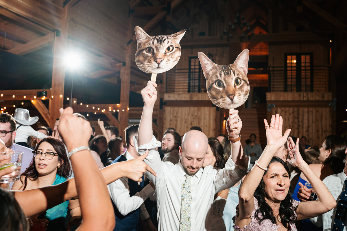 Reception decor featuring rustic charm and romantic candlelight