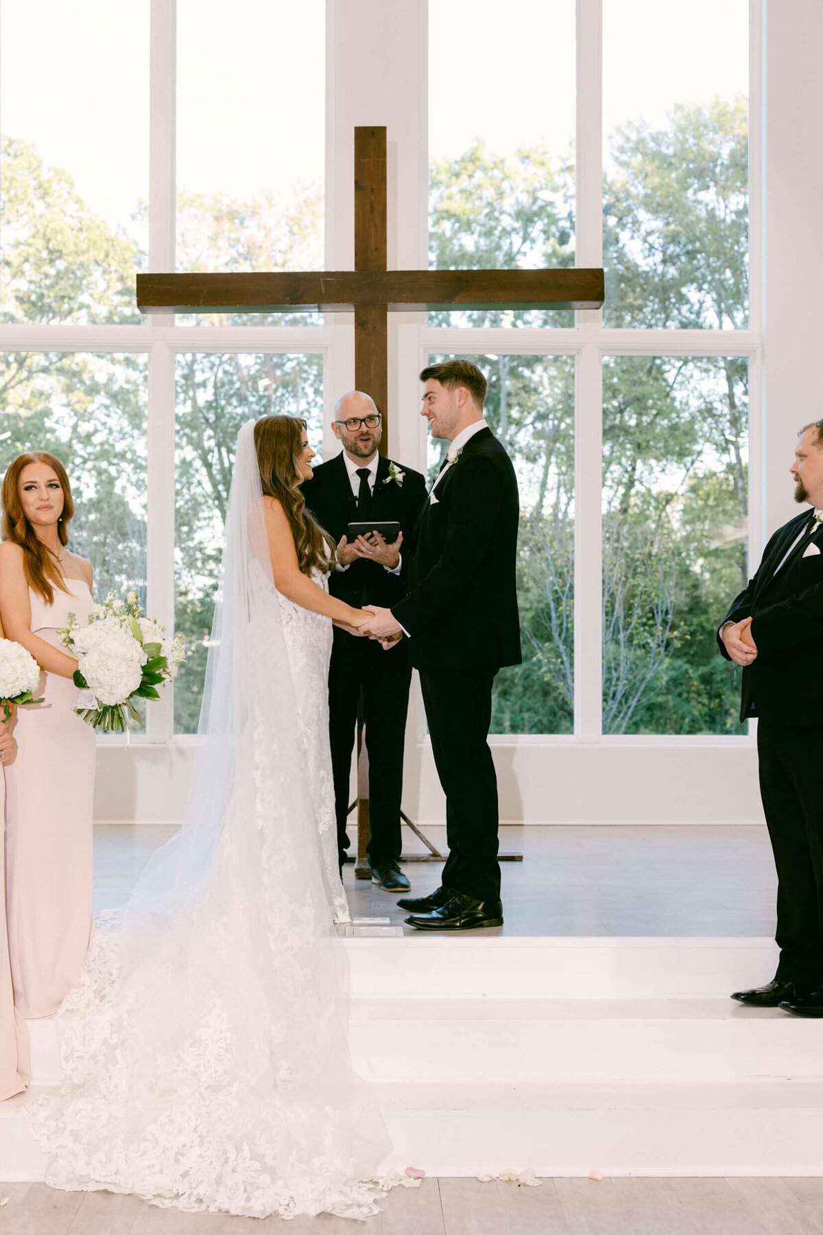 A wedding photo of the bride and groom during the ceremony