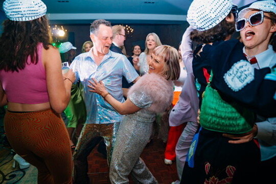 Wedding guest dancing and having fun