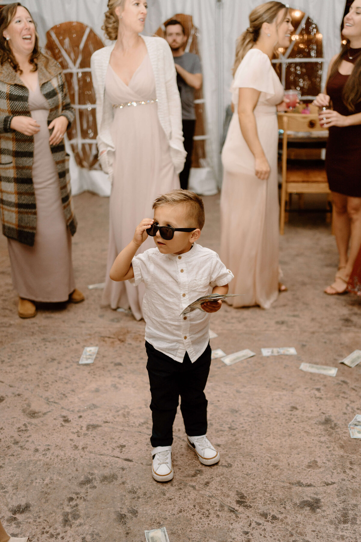 young boy at wedding reception at Elizabeth farms, Lancaster, PA