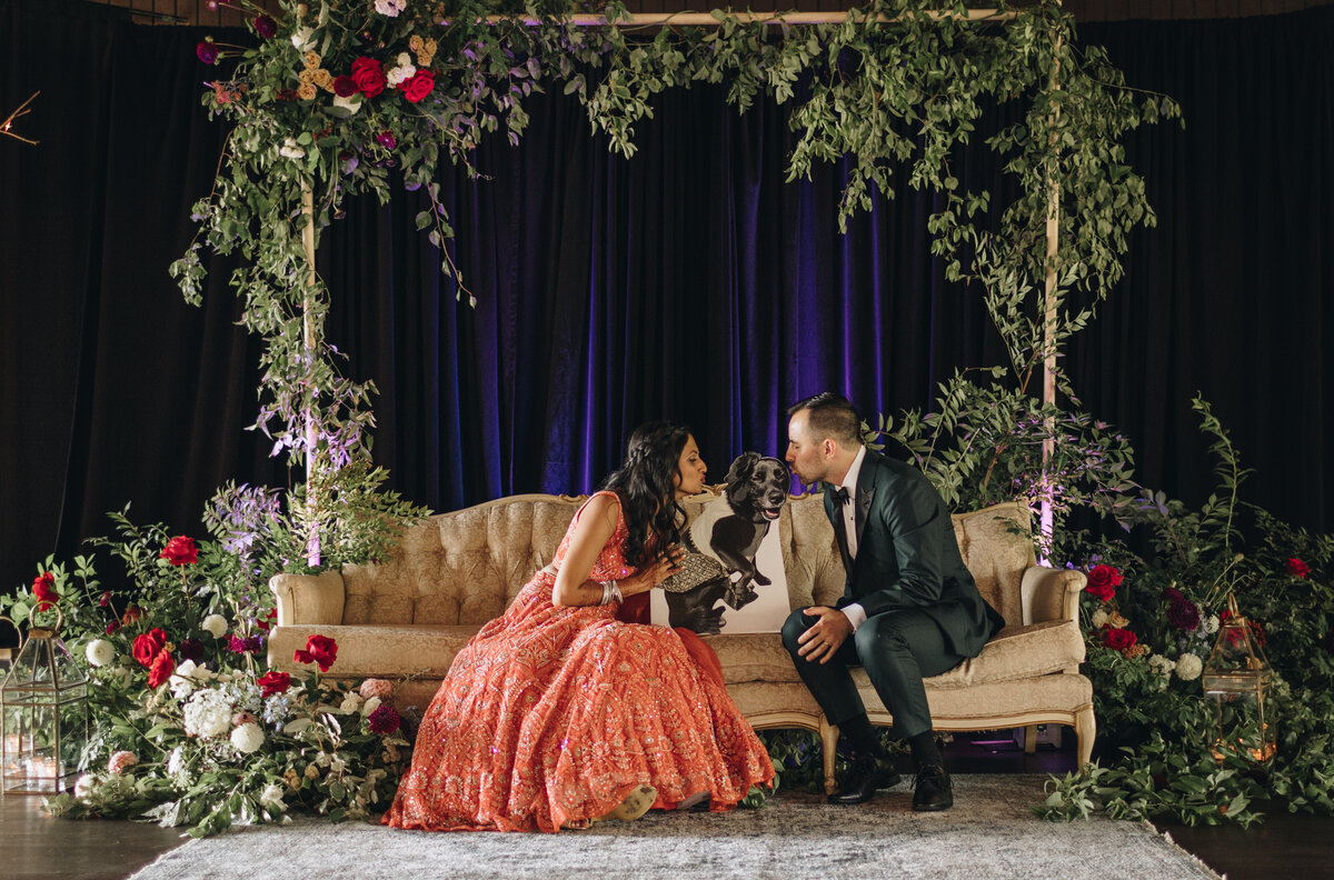 TONY + REKHA Ashville Wedding Day 2 - RECEPTION- before dinner reception decor details- stage seating with the couple portrait 1