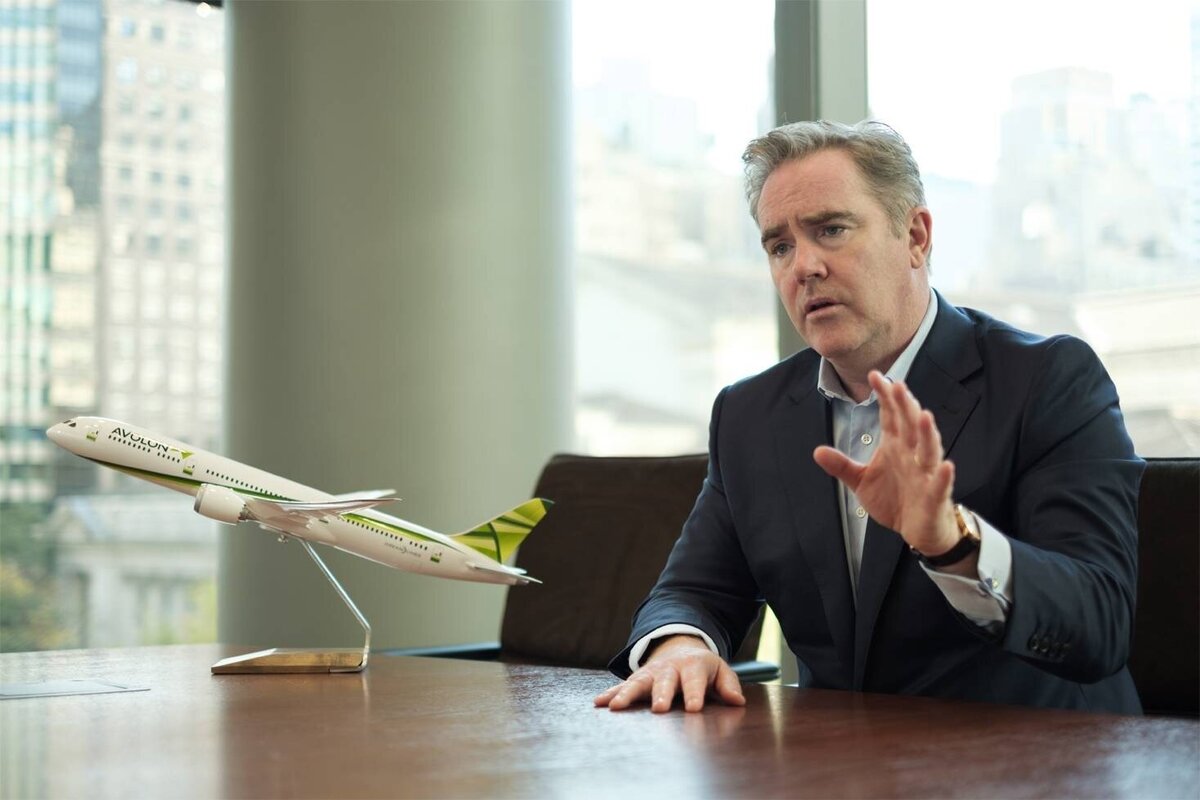 Professional NJ headshot of confident man speaking at corporate event podium
