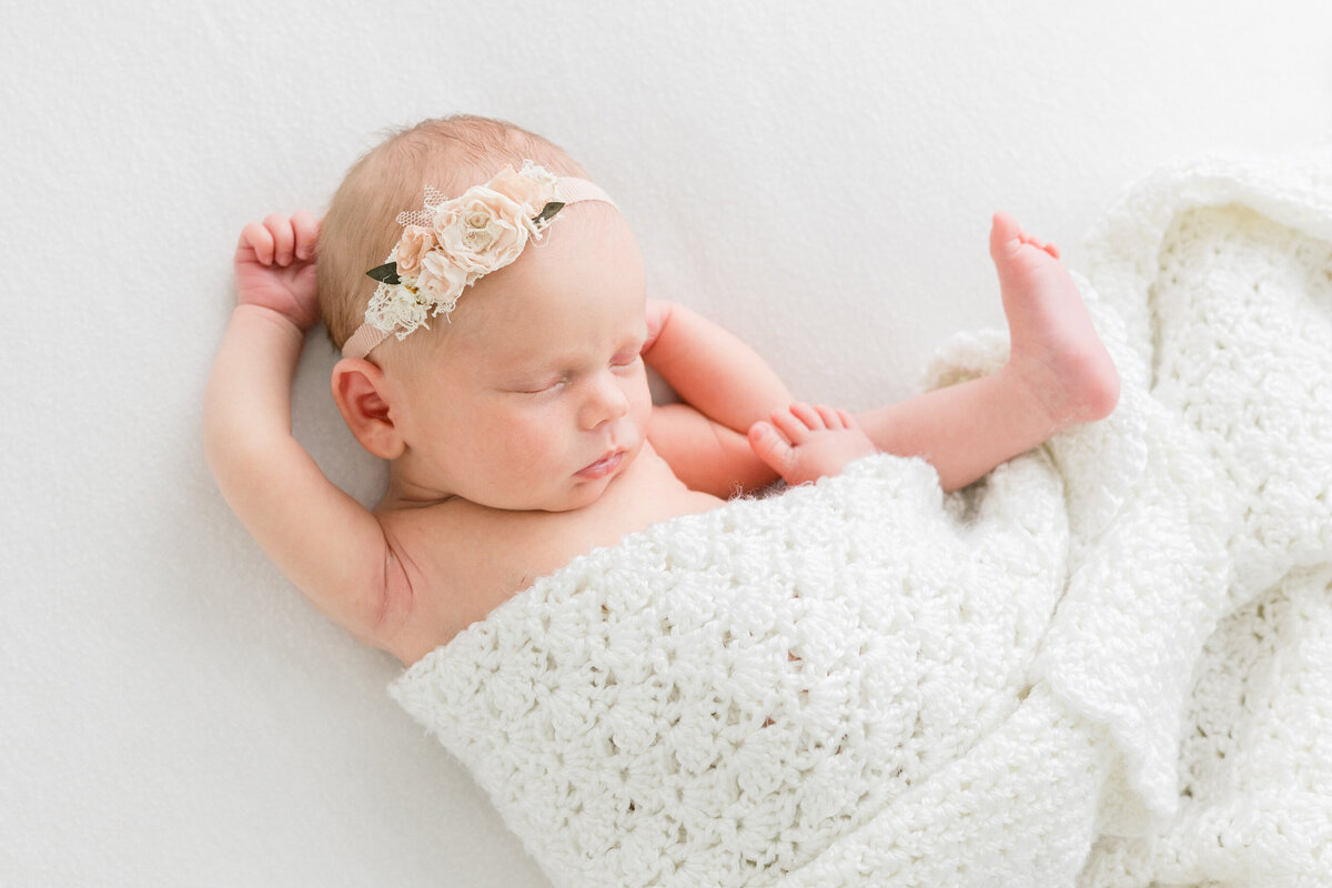 a newborn baby girl sleeping