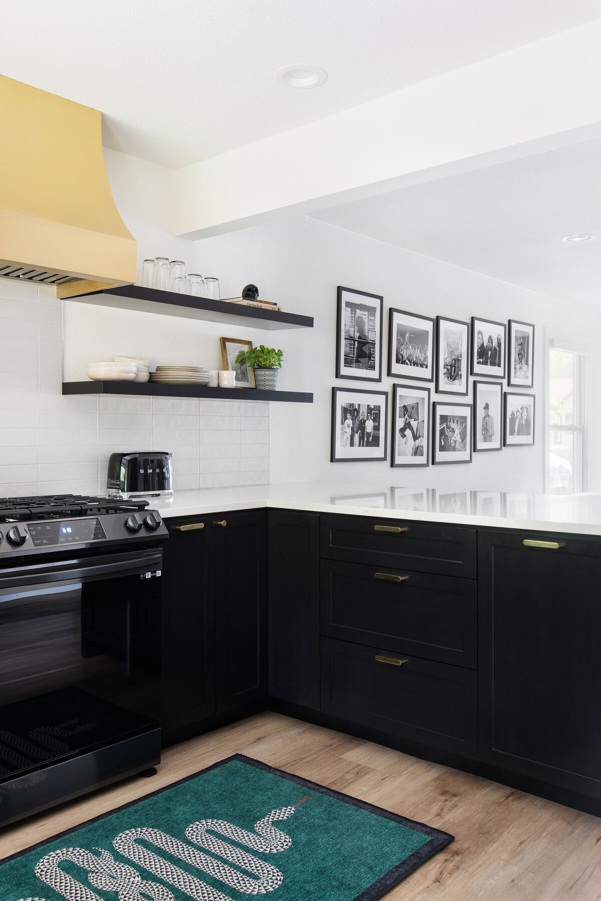 modern chic posh kitchen black and brass remodel rental design 5