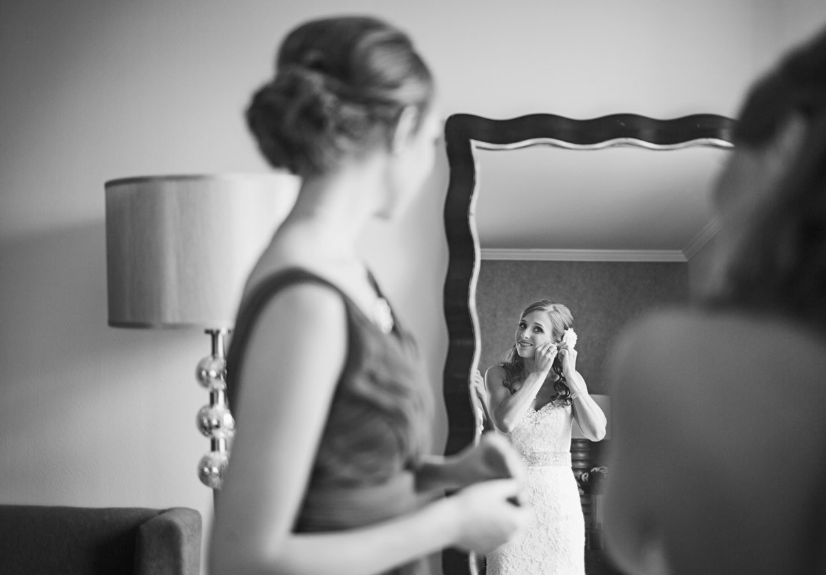 bride and sister getting ready