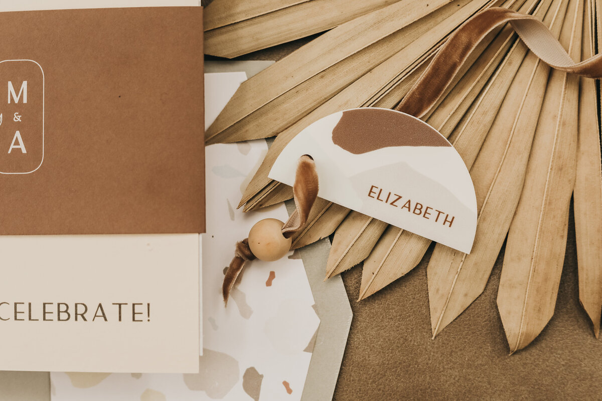 Boho inspired terracotta and sand coloured wedding invitations and signage by The Social Page, custom wedding invitations & signage based in Calgary, Alberta.  Featured on the Brontë Bride Vendor Guide.