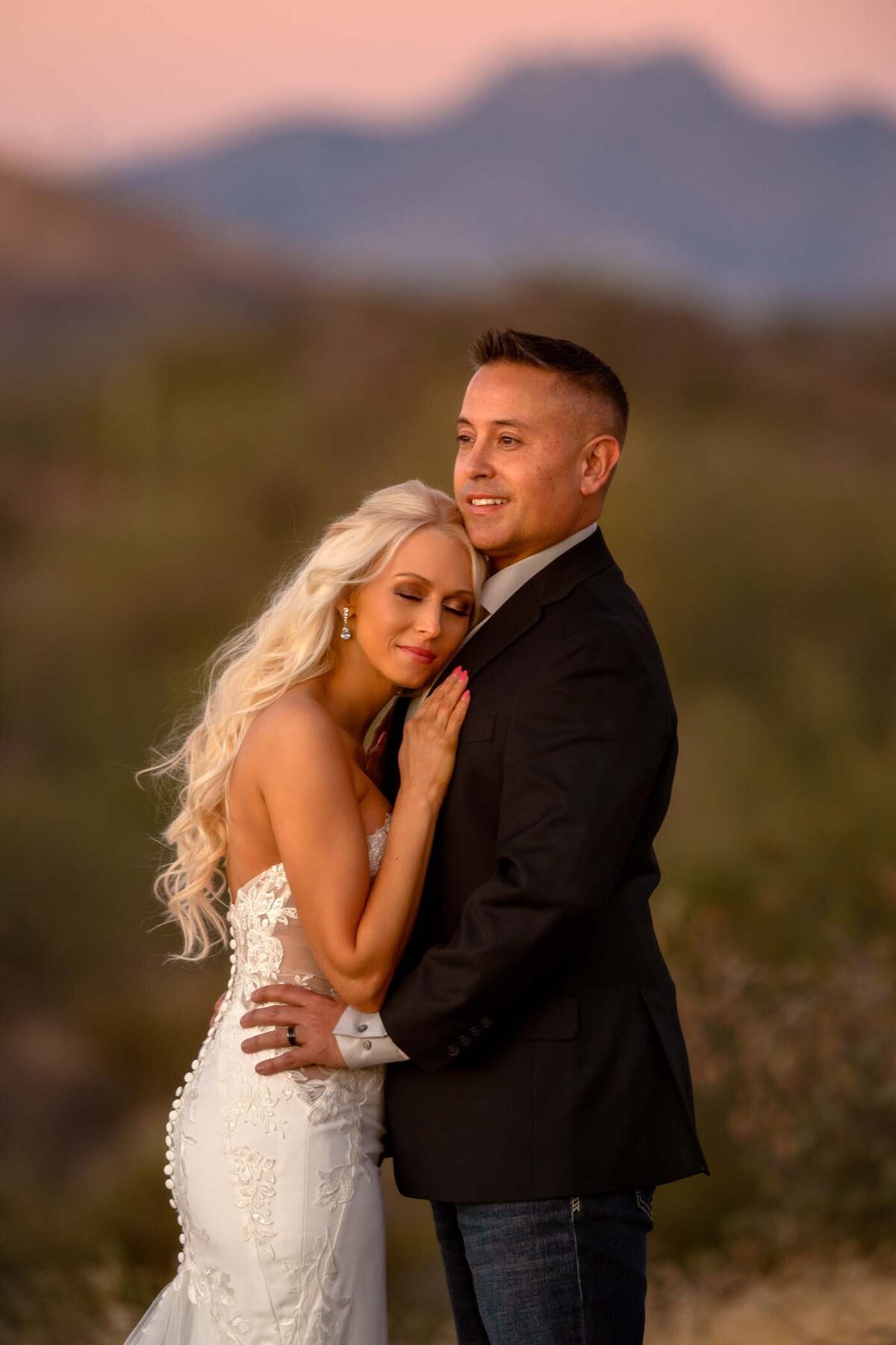 Golden hour portrait of bride and groom in Arizona Lost Dutchman park
