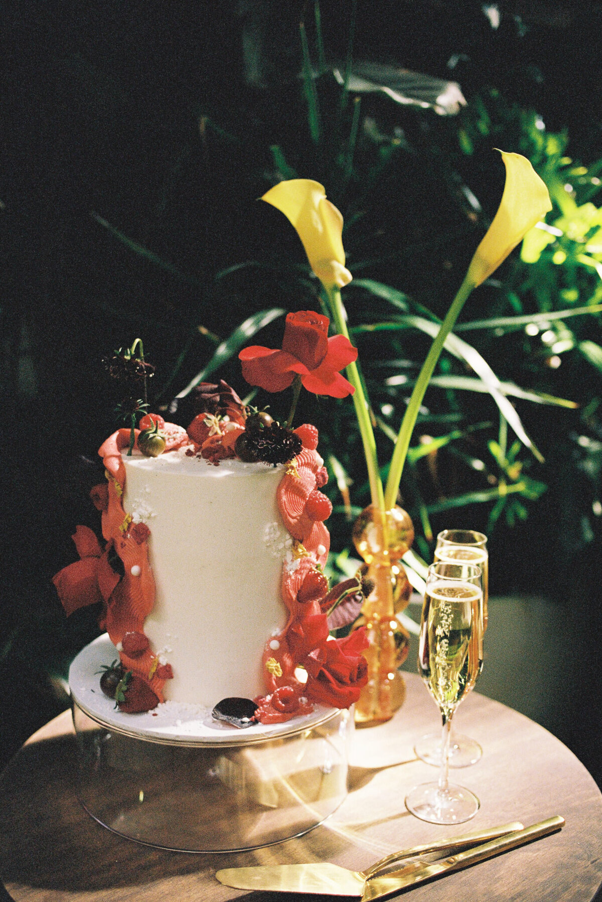 Colourful wedding cake photographed by Melbourne wedding photographer on 35mm film at Glasshaus Inside