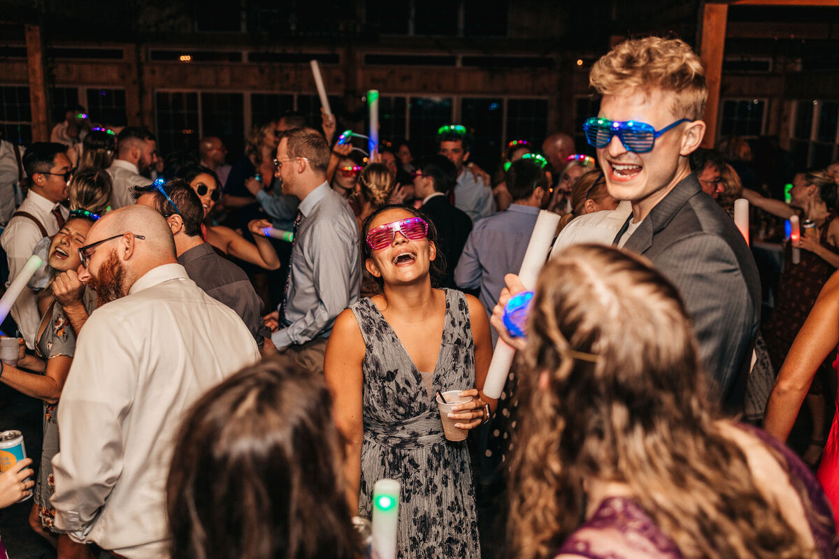 Dancing with light up glasses glow sticks at Cobb Hill Estate reception by Lisa Smith Photography