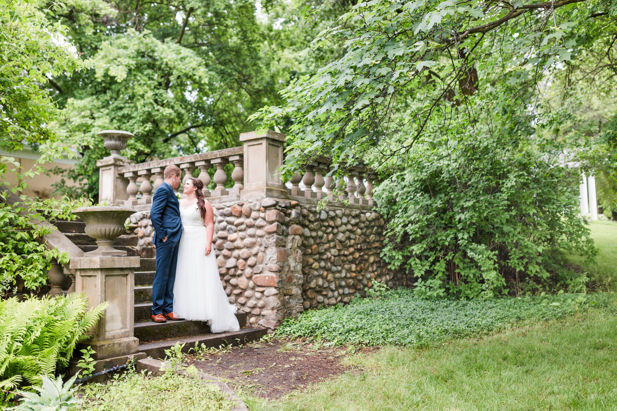 A collection of wedding photography highlights showcases the most memorable moments of the bride and groom's special day. The images capture a variety of scenes: the bride and groom sharing their first kiss, exchanging vows, and walking hand-in-hand down the aisle. There are close-up shots of their wedding rings, the intricate details of the bridal bouquet, and candid moments of laughter and joy among family and friends. The gallery includes a mix of black-and-white and color photographs, each framed beautifully to highlight the emotions and significance of the day. Soft, warm lighting in the images enhances the romantic atmosphere, making each moment feel timeless and full of love.