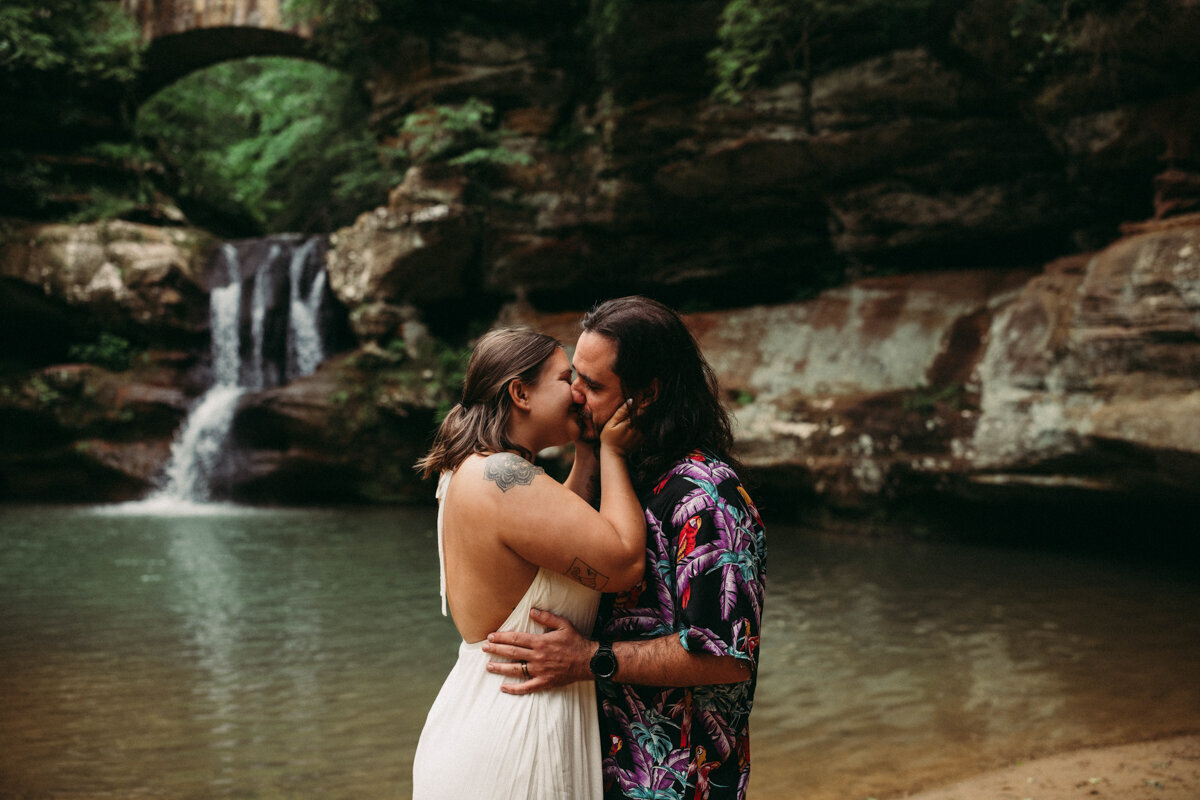 First kiss at elopement in Ohio waterfall