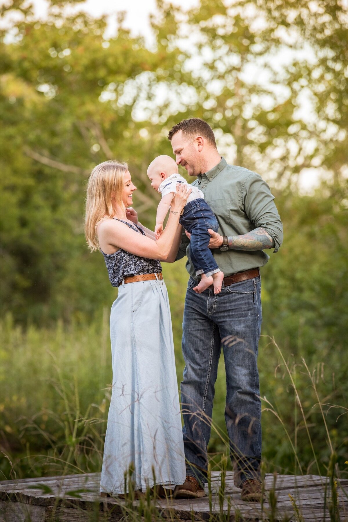 Family Portraits on dock at the LIttle Ranch Farm with Natasha Snyder Photography in Santa Fe Texas