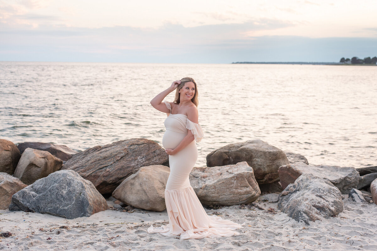 Pregnant mom on beach in Sew Trendy dress at sunset | Sharon Leger Photography | CT Newborn & Family Photographer | Canton, Connecticut