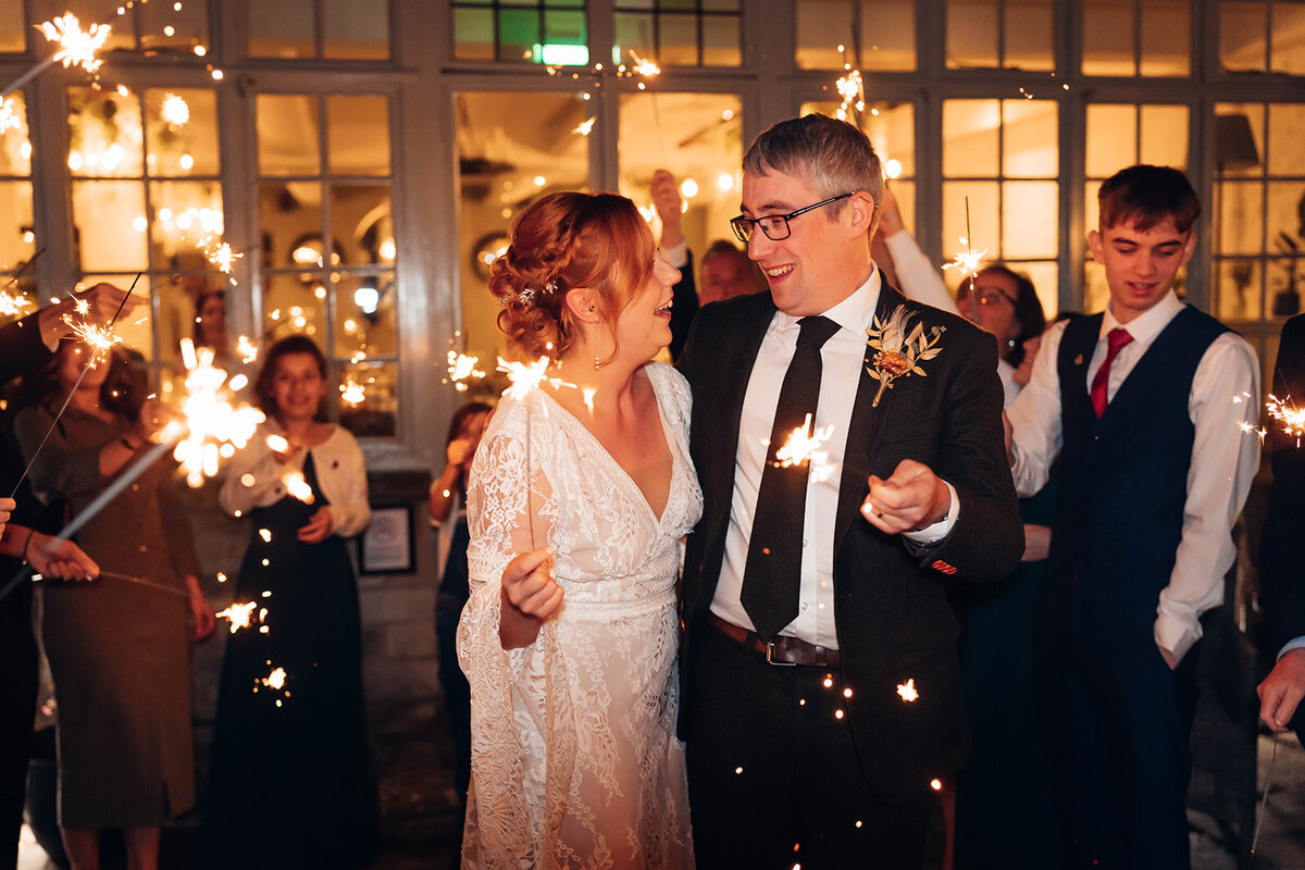 cirencester-wedding-photographer-sparkler-exit-at-the-baytree-burford