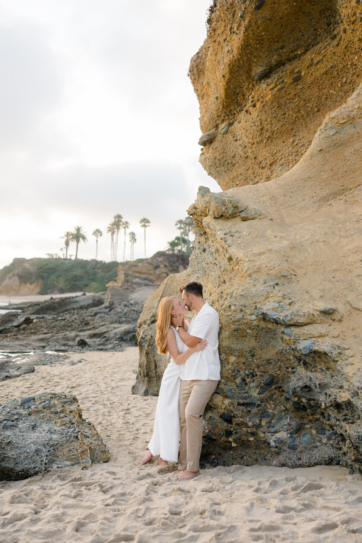 couple kissing on the beach