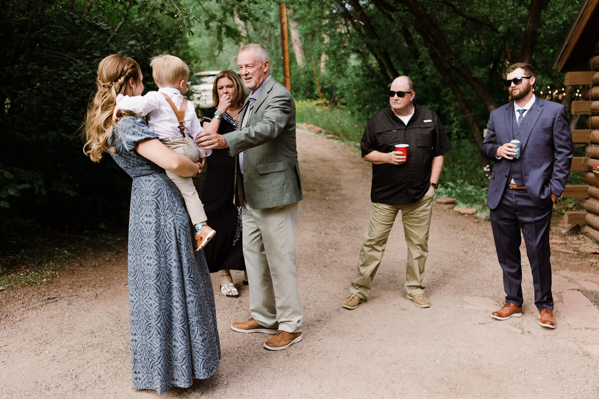 Guests mingling before wedding at Dallenbach Ranch Colorado