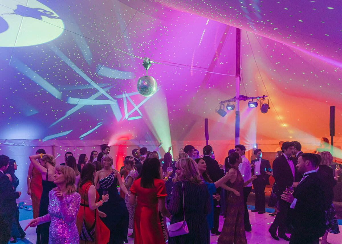 chloe-winstanley-weddings-tent-dancefloor-guests-dancing