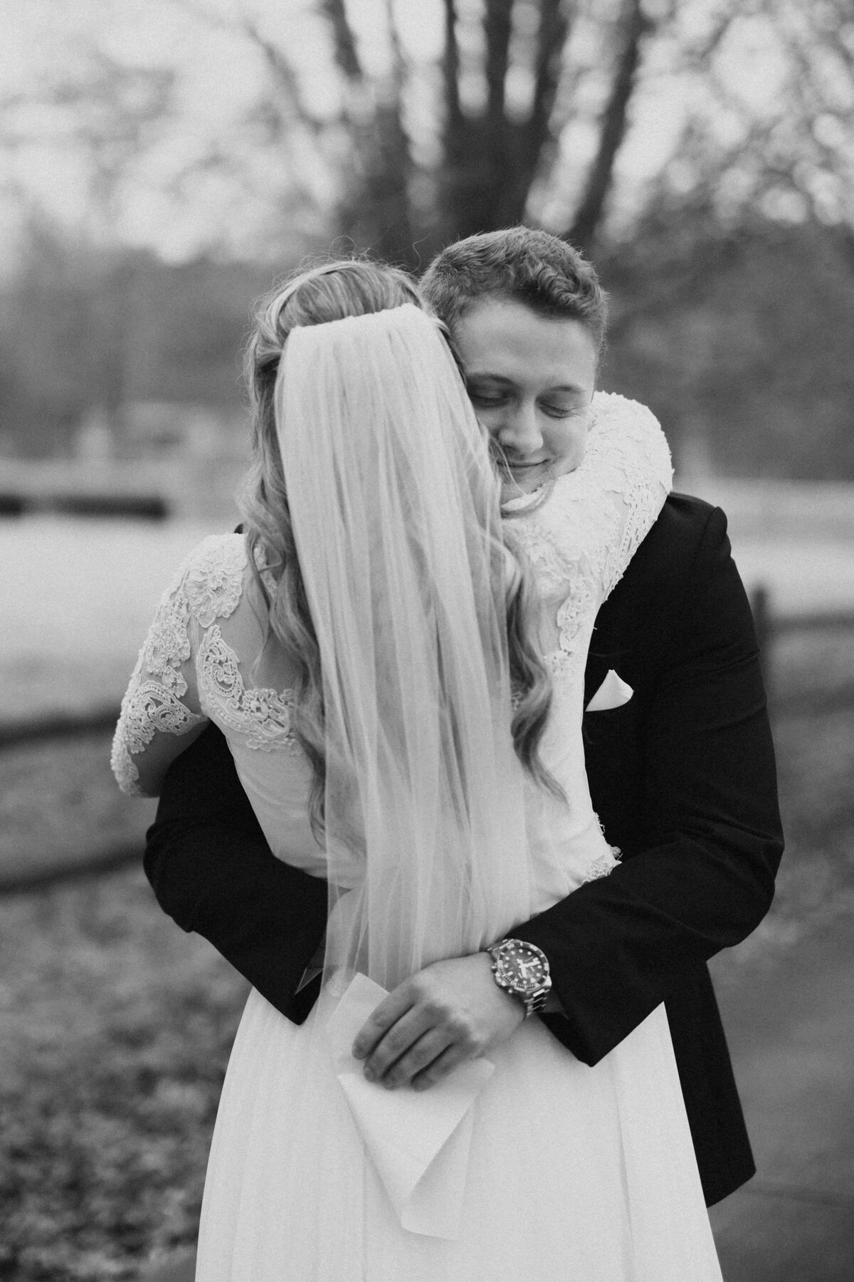 bride and groom embrace