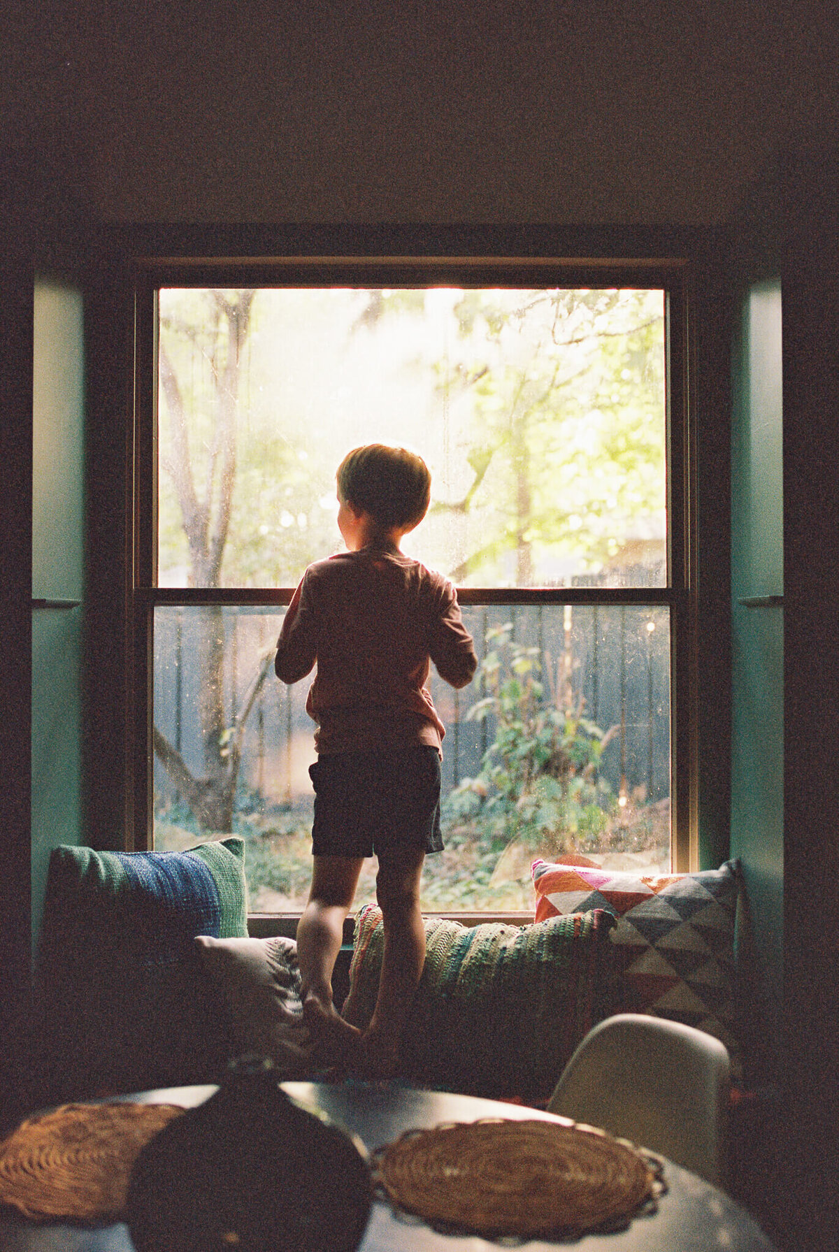 35mm film boy looking out window