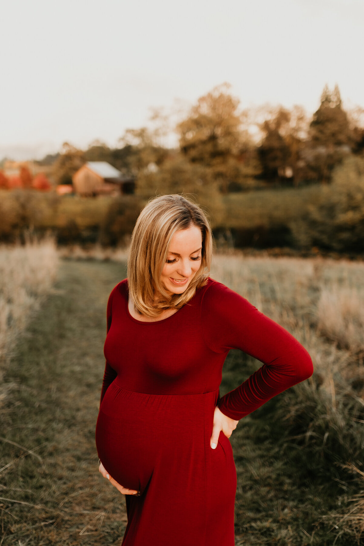 pregnant mom to be in red dress