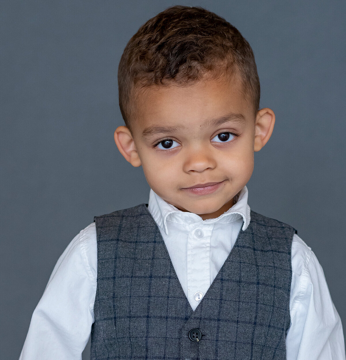 Little boy dressed in a suit ready for his school photos in Port Coquitlam
