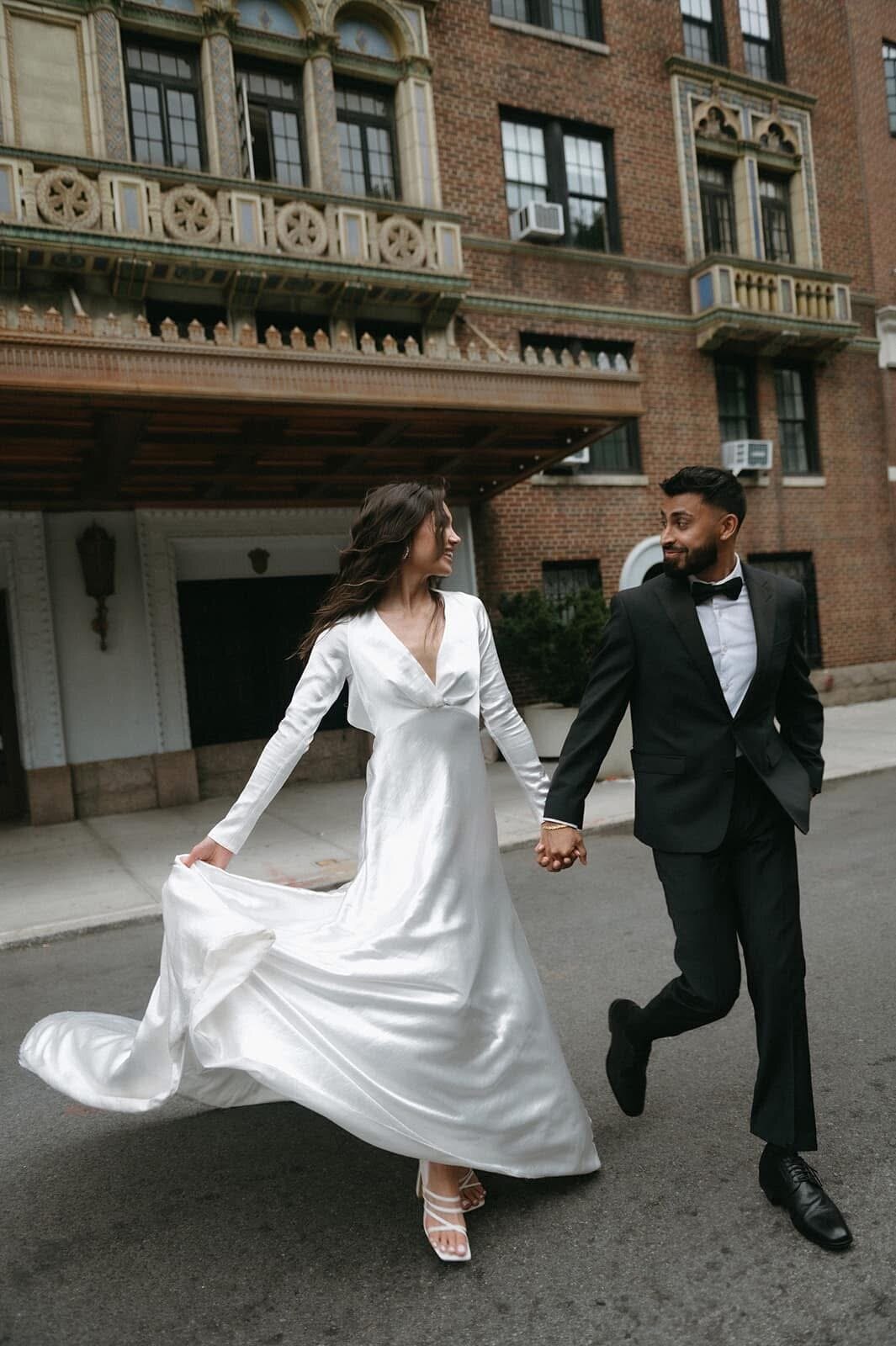 Spontaneous couple dancing in New York City streets captured by luxury photographer Staci Brucks
