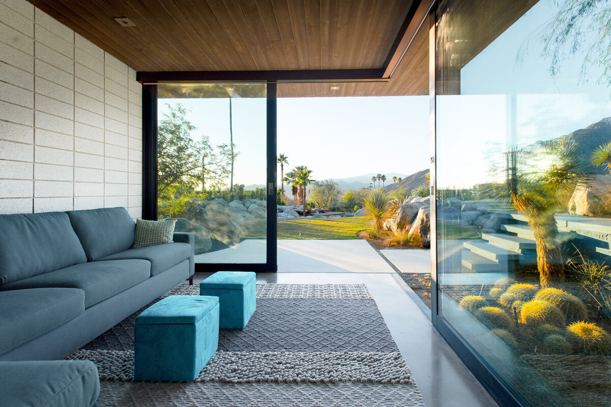 Indoor outdoor living in guest house by pool