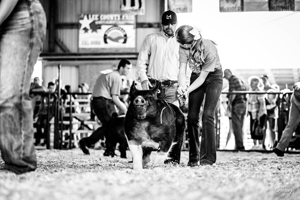 girl driving hog looking at judge