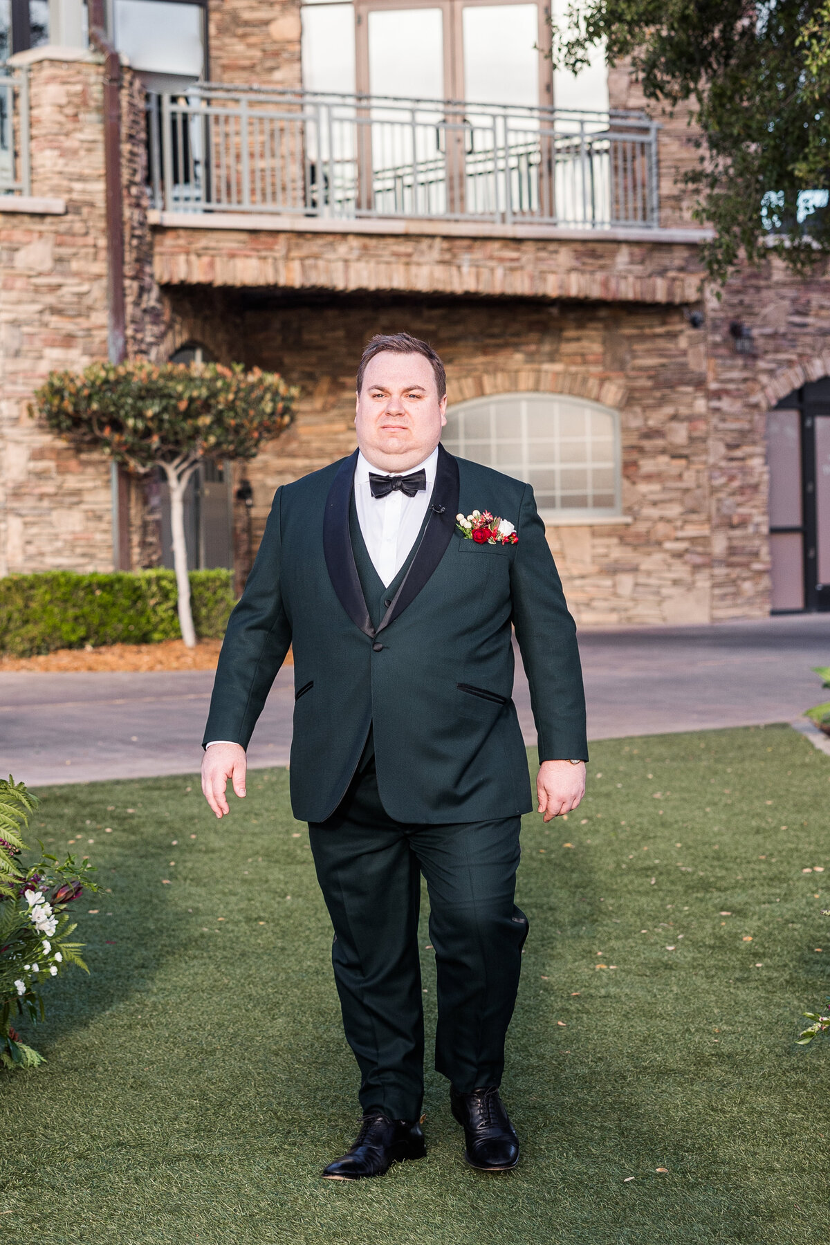 groom-walking-down-aisle-the-crossings-carlsbad