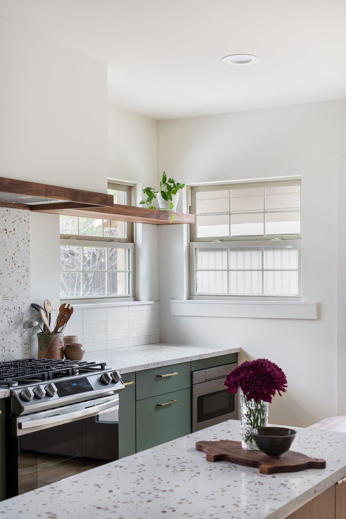hello-home-modern-kitchen-remodel-green-cabinets-light-wood-floors-terrazzo-backsplash-wood-countertop-4