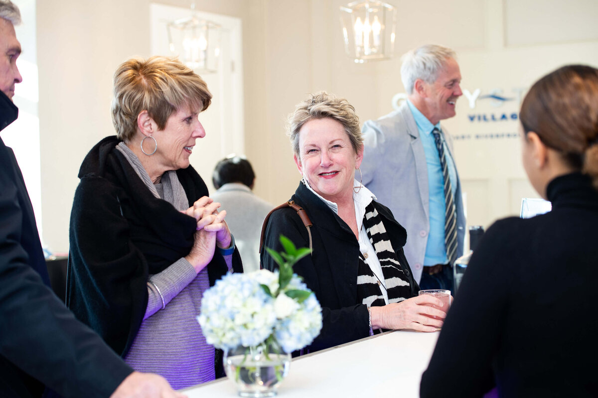 guests lining up to order signature drinks at eQ groundbreaking event.  Captured by Ottawa Event Photographer JEMMAN Photography COMMERCIAL