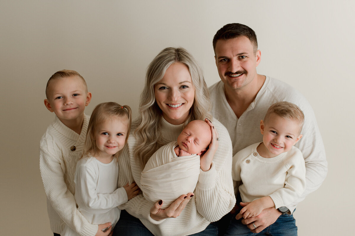 Newborn session with family in studio