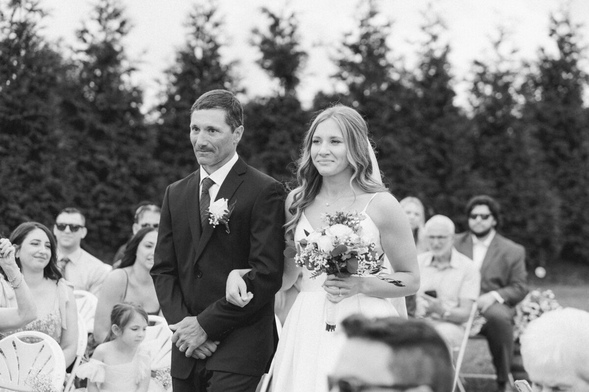 bride-dad-walking-aisle-company-stables