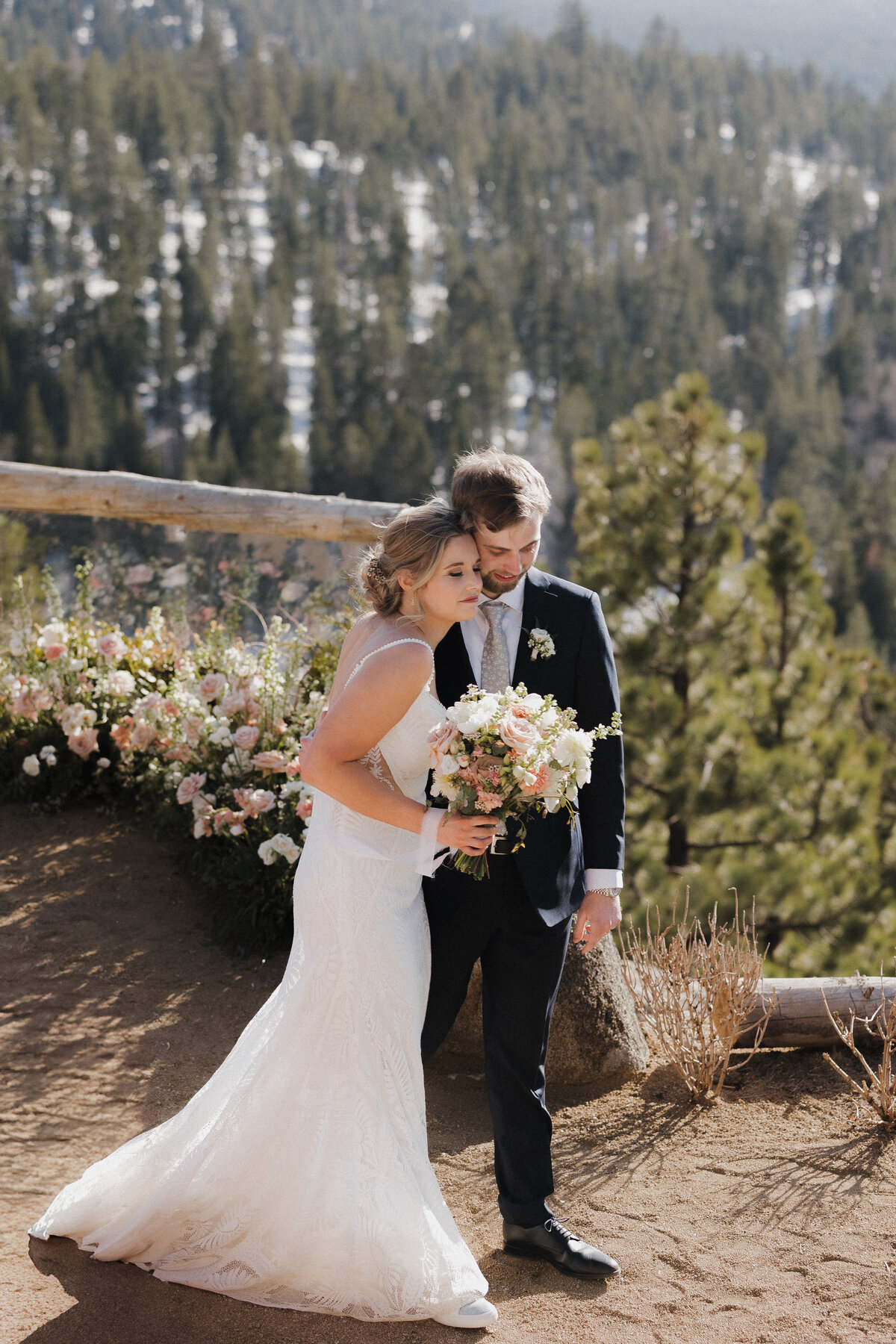 Outdoor wedding ceremony at Tahoe Blue Estate with breathtaking views of the Sierra Nevada mountains and Lake Tahoe.