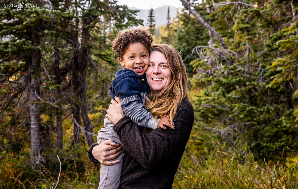 Cute Photo of a son with his mama in the woods of Colorado